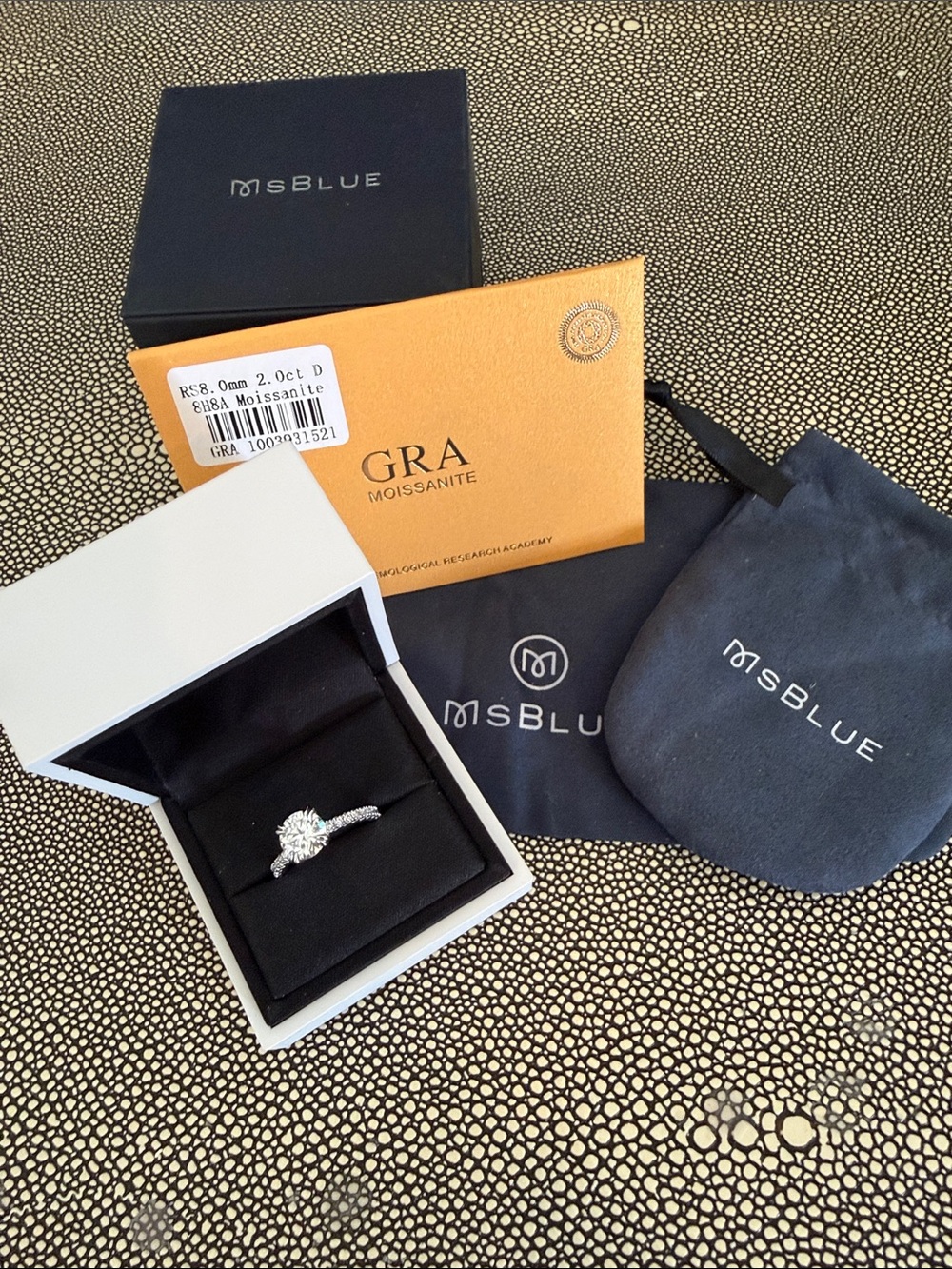 Round Moissanite Engagement Ring